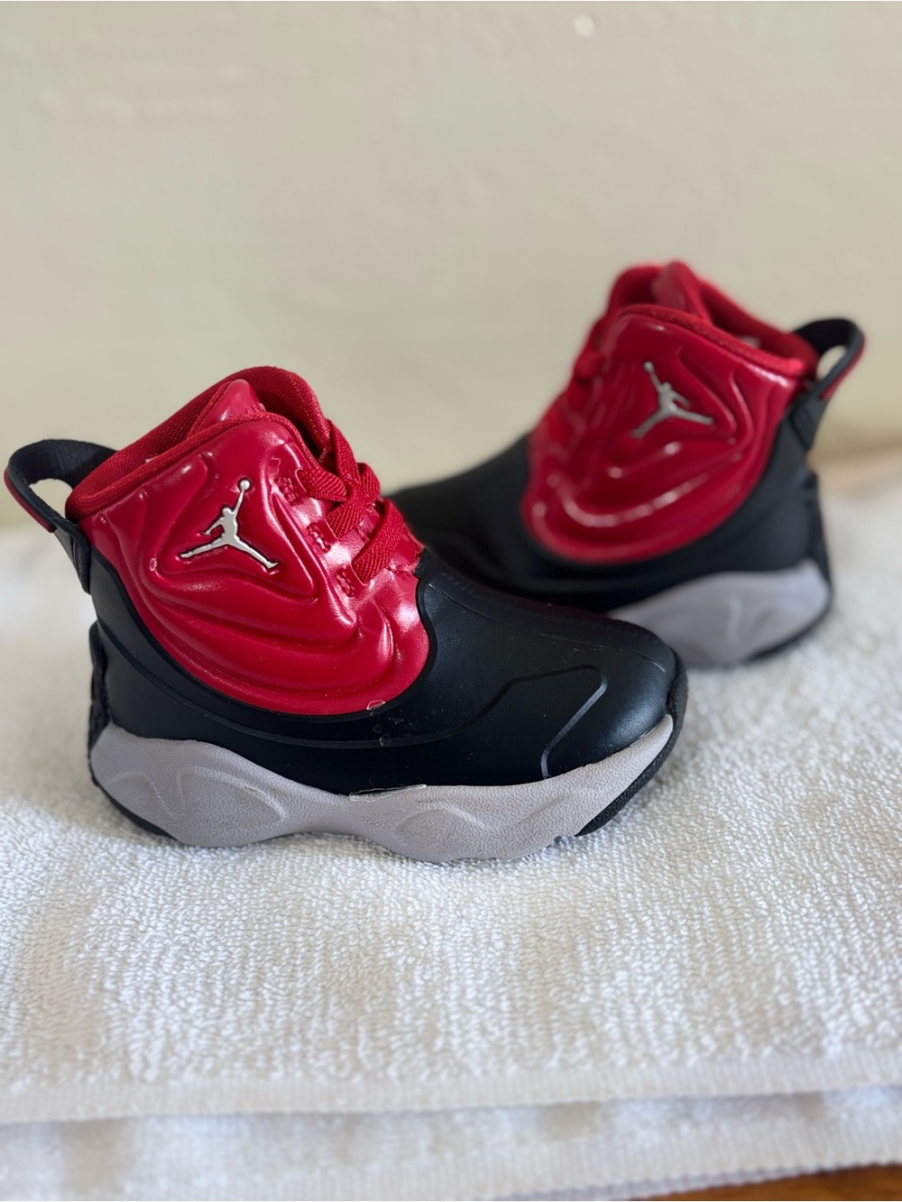 Jordan Kids Black and Red High-Top Sneakers